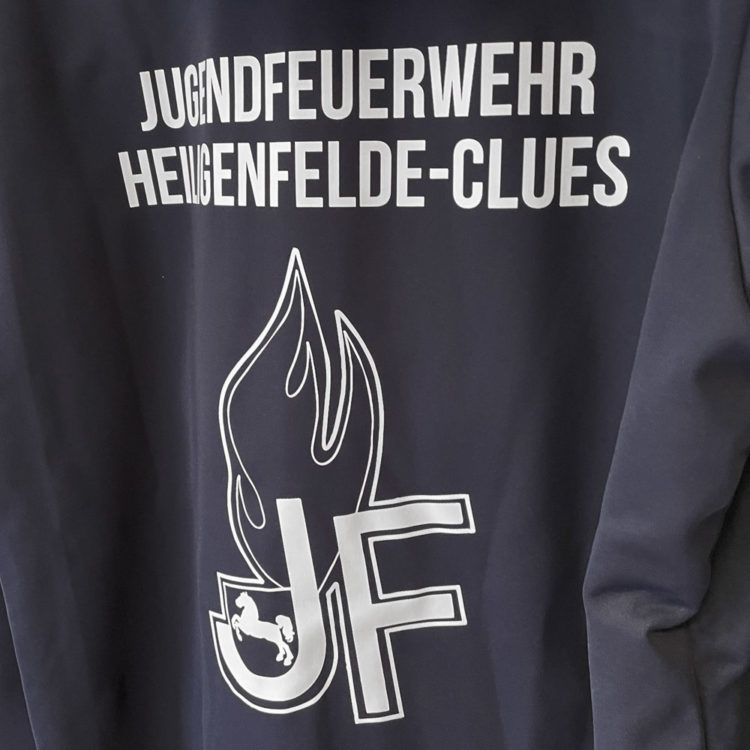 weißes Feuerwehr Logo Bedruckung auf den Softshelljacken