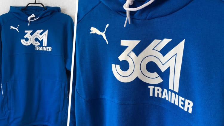 Schriftzug Puma Trainer Hoodie 361 Trainer Introauf dem Rücken