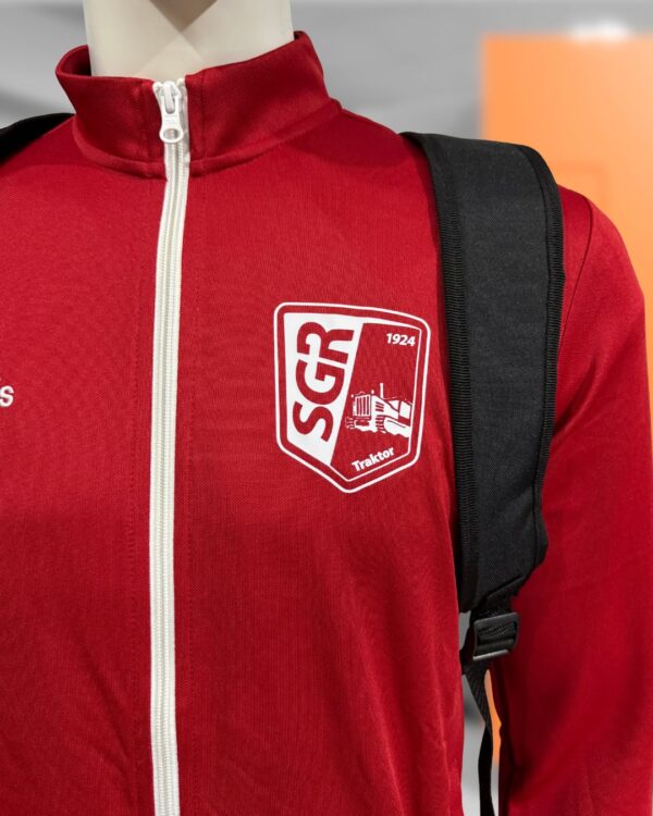 Vereinslogo auf den Trainingsjacken als weiße Bedruckung