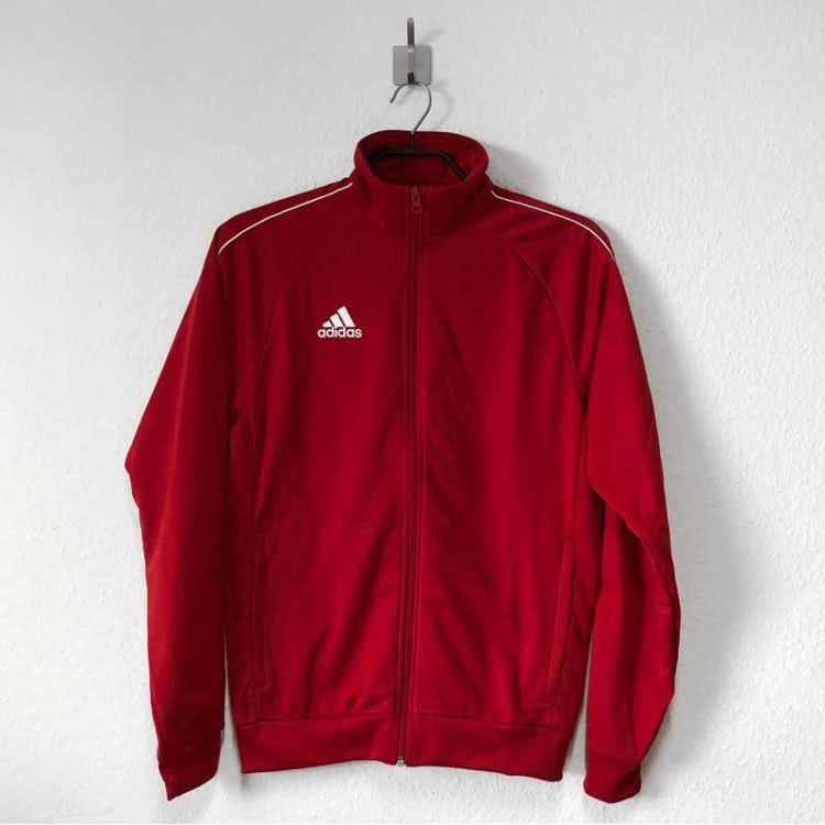 Die adidas Core Polyesterjacke des SG Hansühn Schönwalde