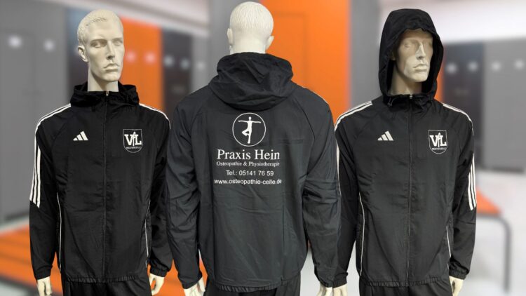 Die adidas Windreaker Jacke mit Kapuze und Bedruckung auf Brust und Rücken