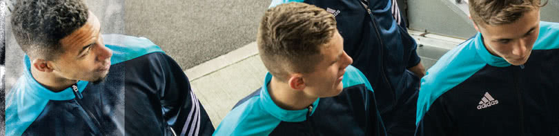 Die Adidas Sereno 14 Sportbekleidung der Teamsport Linie Adidas Sereno 14 Teamsport Linie mit Trainingsanzüge und T-Shirt